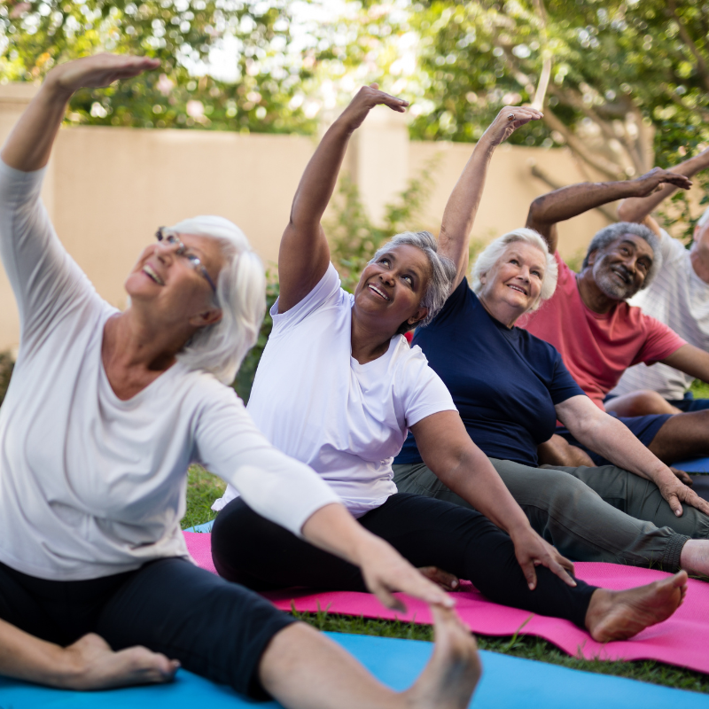 Older people doing yoga